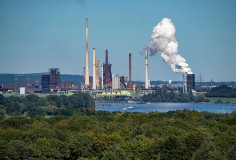 View across the Rhine to the Thyssenkrupp Steel steelworks in Duisburg-Beeckerwerth, blast