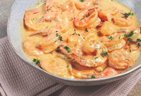 Shrimp in creamy garlic sauce, with spices and herbs