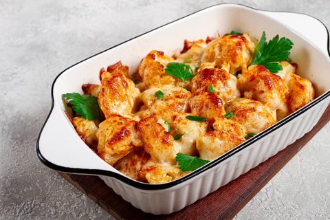 Baked cauliflower, in cream sauce, with cheese and spices, homemade, no people