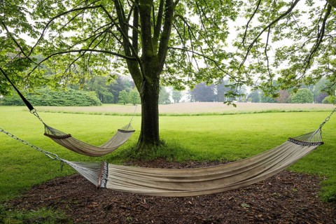 Hammocks in the park, moated castle, Schloss Dyck, Jüchen, Lower Rhine, North Rhine-Westphalia,