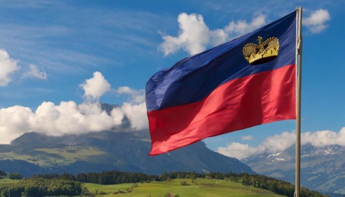 The flag of Liechtenstein flutters in the wind