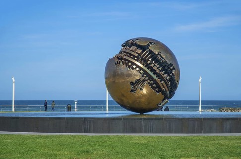 Sfera Grande, sculpture by the artist Arnaldo Pomodoro on the promenade in Pesaro, Marche region,