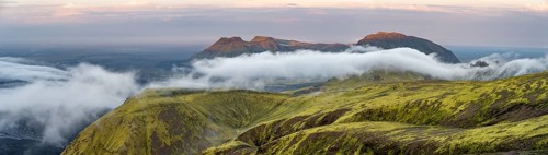 Fog between mountains, moss-covered volcanic mountain landscape, at sunset, Pakgil, Iceland, Europe