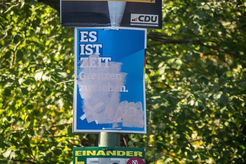 State election in Brandenburg 2024: parties canvass for votes on election posters. Graffitied