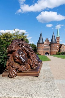 Holstentor Holsten Tor with Lübeck Lion in the Hanseatic city of Lübeck, Germany, Europe