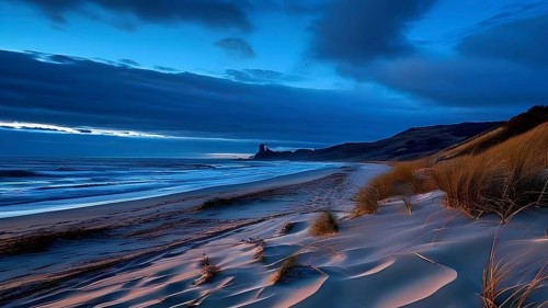 Sunset mood on a whispering tranquil costal landscape with sandy beach, AI generated