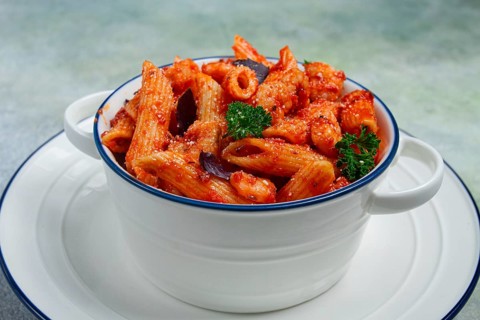 Penne pasta, with shrimp in tomato sauce, close-up, no people
