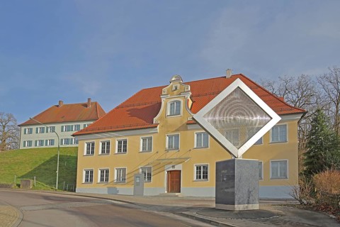 Art museum built in 1785 and square sculpture made of stainless steel with slats, ribs, square,