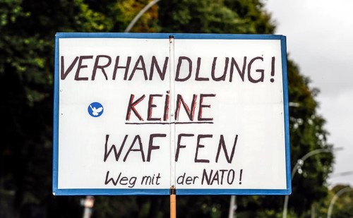 Poster at the demonstration of the alliance Never again war on the Day of Unity in Berlin, 03.10