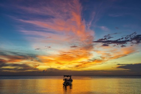 Longtail boat in sunset, sunset, horizon, evening light, boat, sun, evening mood, cloudy sky,