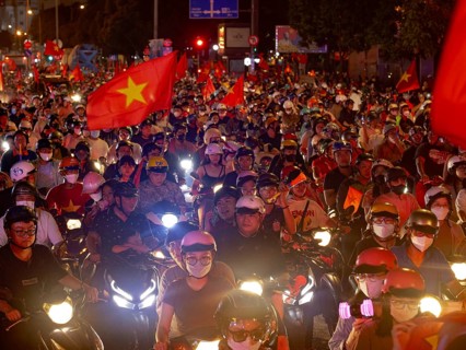 Football fans celebrate in the streets, victory in Asean championship against Thailand, many