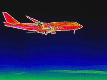 Aircraft on approach, Boeing 747, thermal image or thermography, symbol photo, interpolated.