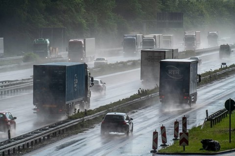A2 motorway, at Recklinghausen motorway junction, heavy traffic during a thunderstorm, North