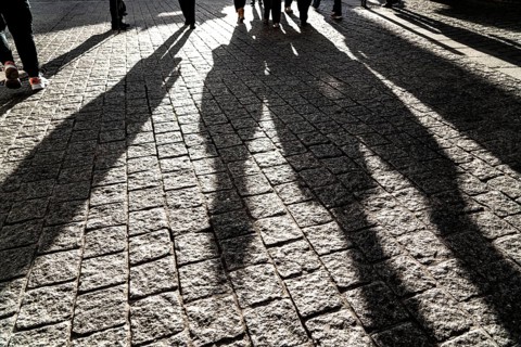Pedestrians in a pedestrian zone, winter, long shadows, Dortmund, North Rhine-Westphalia, Germany,