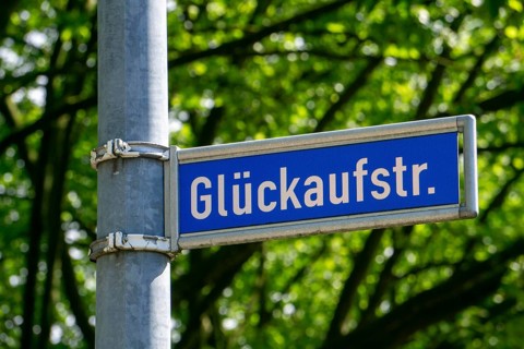 Street sign of Glückaufstraße in Essen-Stoppenberg, former miners' settlement, North