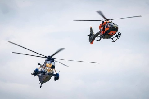 A Sea King MK41 multi-purpose helicopter and an H145 search and rescue helicopter, photographed as