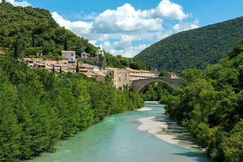 Nyons located in the Baronnies. The old bridge crossing the l'eygues river, Alpes de Haute Provence