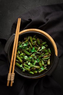 Fried bean pods, in soy sauce, with sesame seeds, homemade, no people