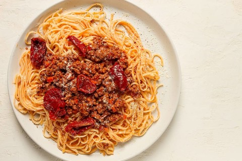 Spaghetti bolognese, with dried tomatoes, homemade, close-up