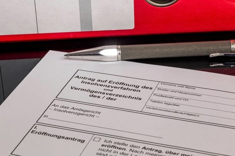 Symbolic image of insolvency: close-up of an application to open insolvency proceedings