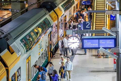 Platform with passengers, Gesundbrunnen station with ODEG regional train. Berlin, Germany, Europe