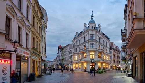 Szeroka Street in the medieval old town of Thorn, illuminated in the evening. The historic city