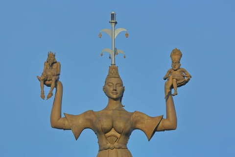 Sculpture Imperia by Peter Lenk 1993, detail, figures, woman in outstretched arms holding two