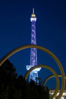 The radio tower shines in the colours of the IFA (Internationale Funkausstellung) on the exhibition