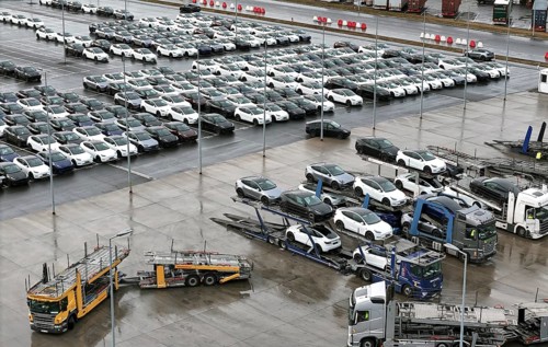Tesla Y new cars are loaded onto car transporters at the Tesla Giga Factory, Grünheide, 25.09.2024