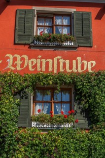 Meersburg on Lake Constance, inscription wine bar, wine, restaurant, flower box, close-up,