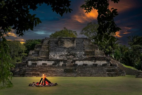Campfire in front of pyramid Altun Belize Central America Fire Via KI