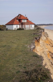 House on cliff top subsequently demolished in March 2011 because of coastal erosion, Easton