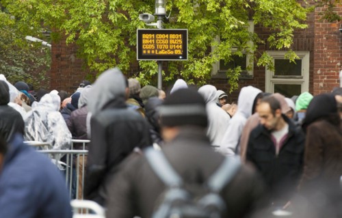 Refugees from Syria waiting to be registered at the Central Reception Centre for Asylum Seekers at
