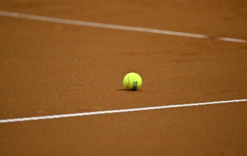 Tennis ball lying on the ground, clay, logo, Roland-Garros, tennis, Porsche Cup 2024, Porsche