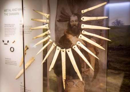 Wolf teeth necklace display relating to Bronze Age shamanism and magic. With permission of