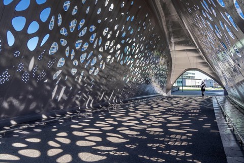 Light effects from the sun in the Parkbruk, a cycle and pedestrian bridge in the city centre of