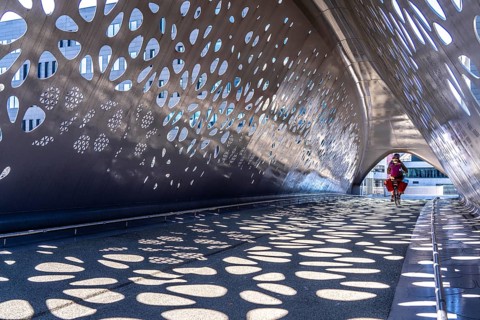 Light effects from the sun in the Parkbruk, a cycle and pedestrian bridge in the city centre of