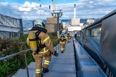 CopenHill, waste incineration plant and artificial ski slope, firefighters under respiratory