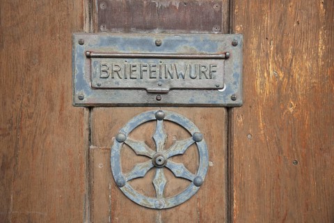 Letter box with city coat of arms, wooden door with fittings, inscription, metal, sheet metal,