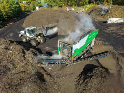 Composting plant, organic waste is composted, sorted by size, smaller parts are reused as compost,