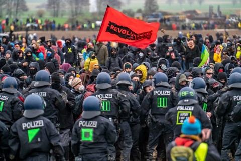 Violent clashes between thousands of demonstrators and the police, after a demonstration against