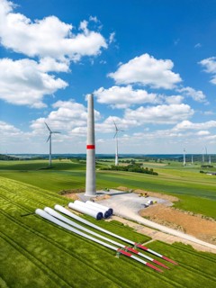 Wind farm near Brilon-Radlinghausen, new wind turbine being built, tower elements and rotors ready
