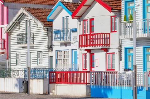 Brightly painted beach homes, Costa Nova do Prado, Aveiro, Portugal, Europe
