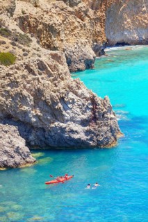 Group of people Kayaking, Tsigrado, Milos Island, Cyclades Islands, Greece, Europe