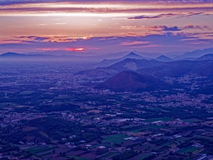 View of the densely populated Neapolitan region and the mountains near Caserta at dusk. San Felice
