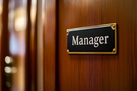 Door sign with text 'manager' in office. Generative Ai, AI generated