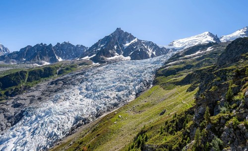 Mountain landscape with glacier Glacier des Bossons and summit of the Aiguille du Midi, Chamonix,