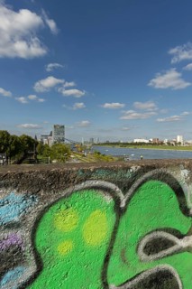 Panorama from the graffiti painted south bridge over the southern Rheinau harbour, the Rhine and