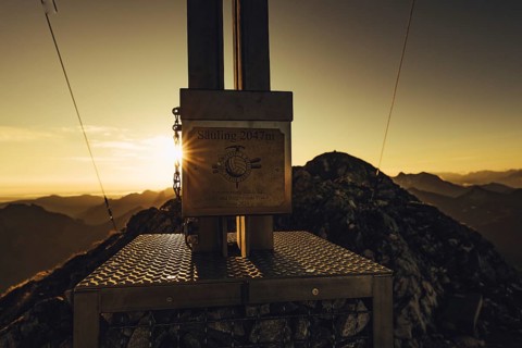 Summit cross, sunrise hiking tour on the Säuling in the Allgäu in Bavaria, Germany, Europe