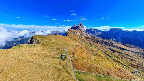The Sas Rigais and Furchetta peaks of the Odle Group, drone shot, Val Gardena, Dolomites,